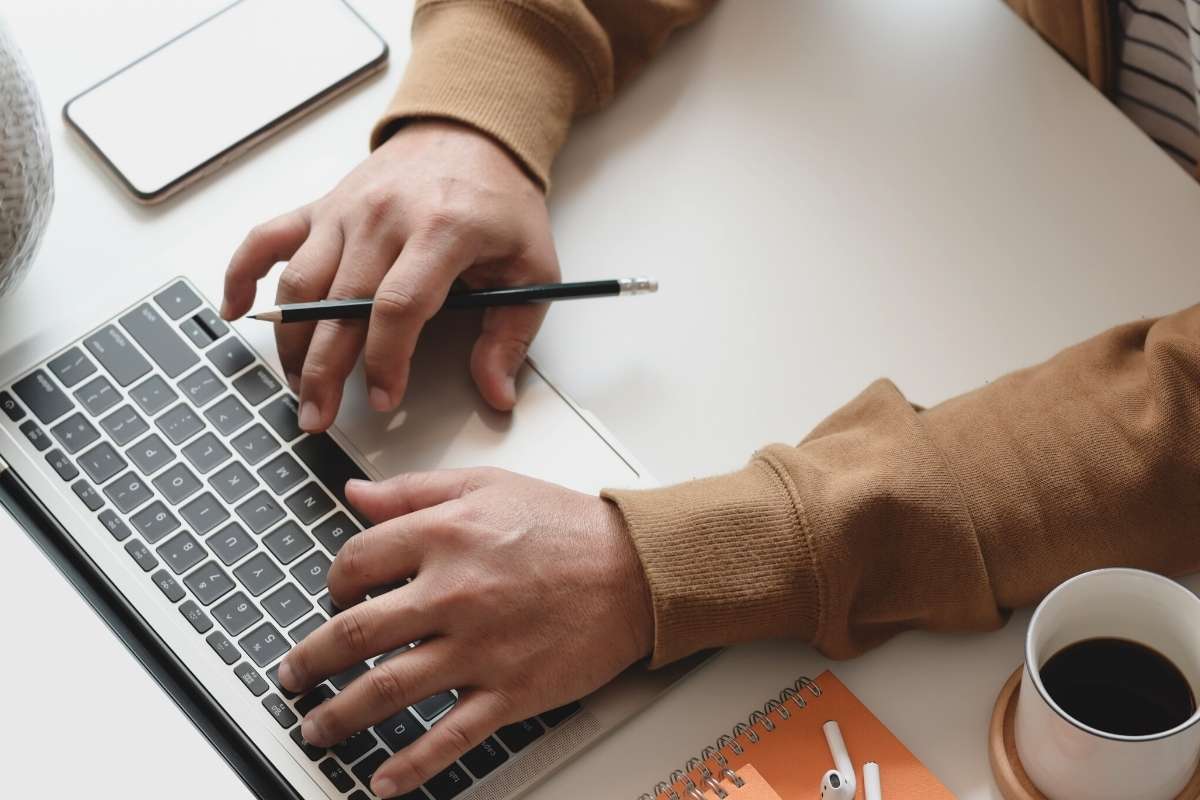 photo of a real estate client in Santa browsing the free download of the home seller's guide for those looking to sell their home in Santa Fe, New Mexico